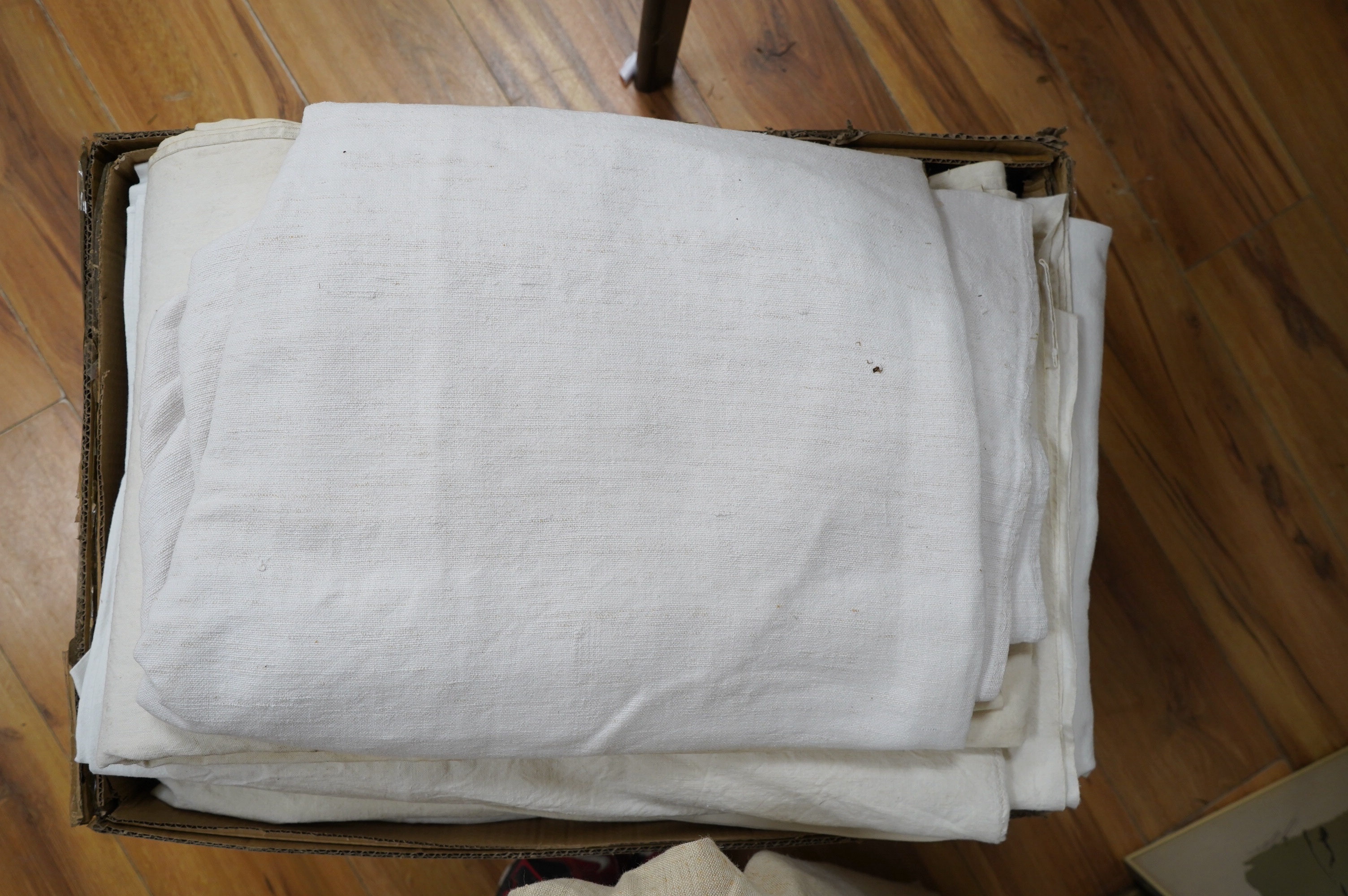 Sixteen French provincial coarse linen sheets, together with a similar roll of approximately 10 meters. Condition - variable